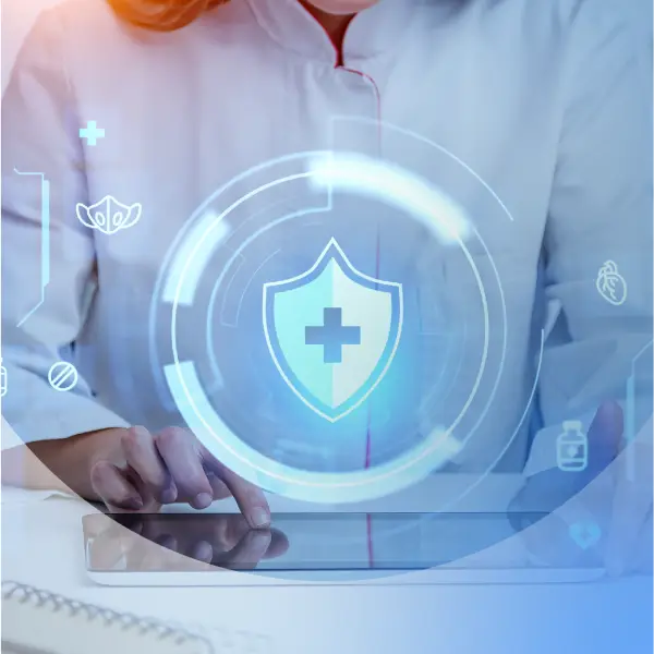Hands using a tablet with a digital shield and medical cross icon, surrounded by healthcare and data security symbols.